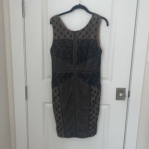 Black and nude dress with leather accents